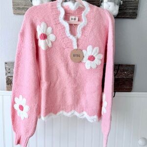 BiBi Pink V-Neck Sweater with White Floral Accents